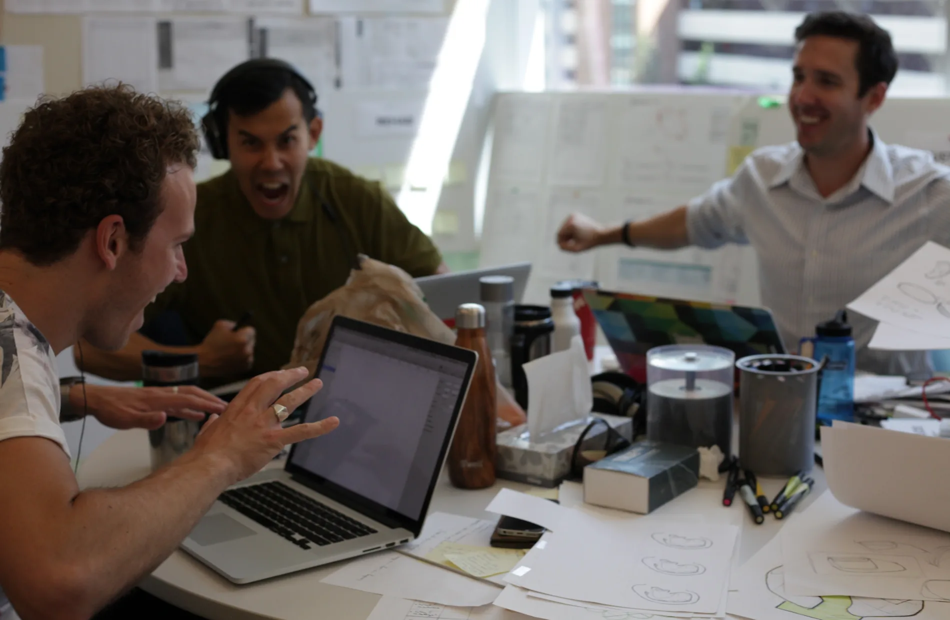 Justin collaborating with his team