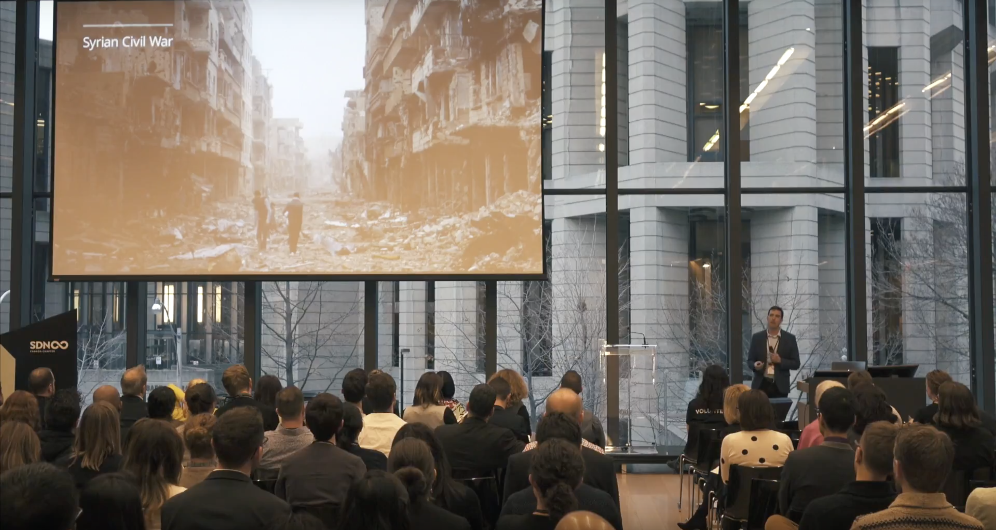 Justin speaking at a design talk